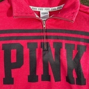 PINK sweatshirt.